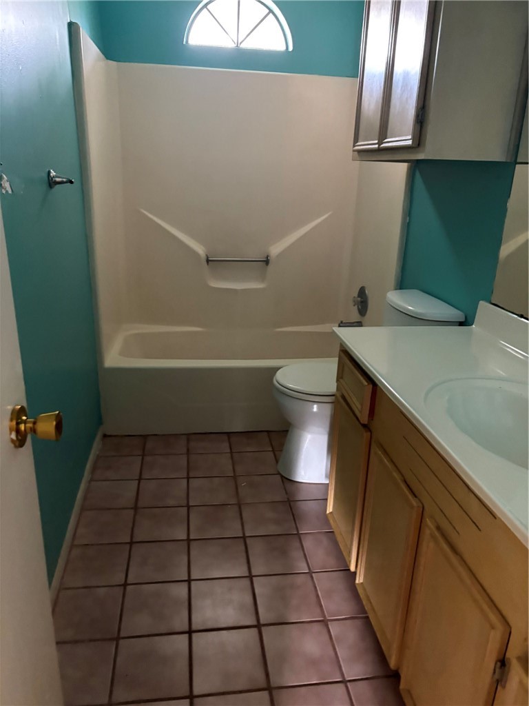 4645 Spring Fork Drive Corpus Christi, TX 78413 - Photo 7 of 7 a bathroom with a sink and a toilet