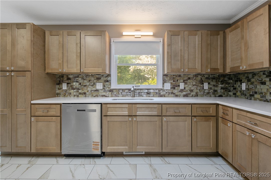 6062 Midus Street Hope Mills, NC 28348 - Photo 14 of 49 a kitchen with a sink and cabinets