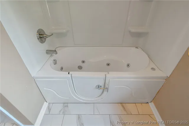 a bathroom with a bathtub