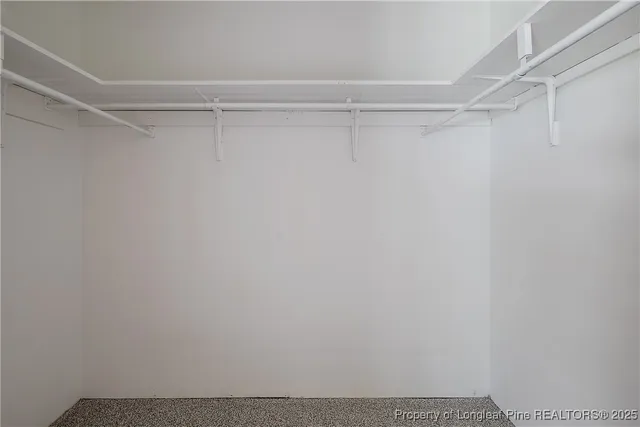 a view of a room with racks on the wall