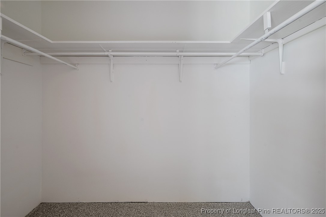 6062 Midus Street Hope Mills, NC 28348 - Photo 21 of 49 a view of a room with racks on the wall