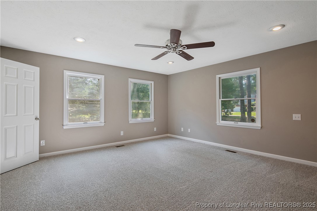 6062 Midus Street Hope Mills, NC 28348 - Photo 24 of 49 a view of an empty room with a window