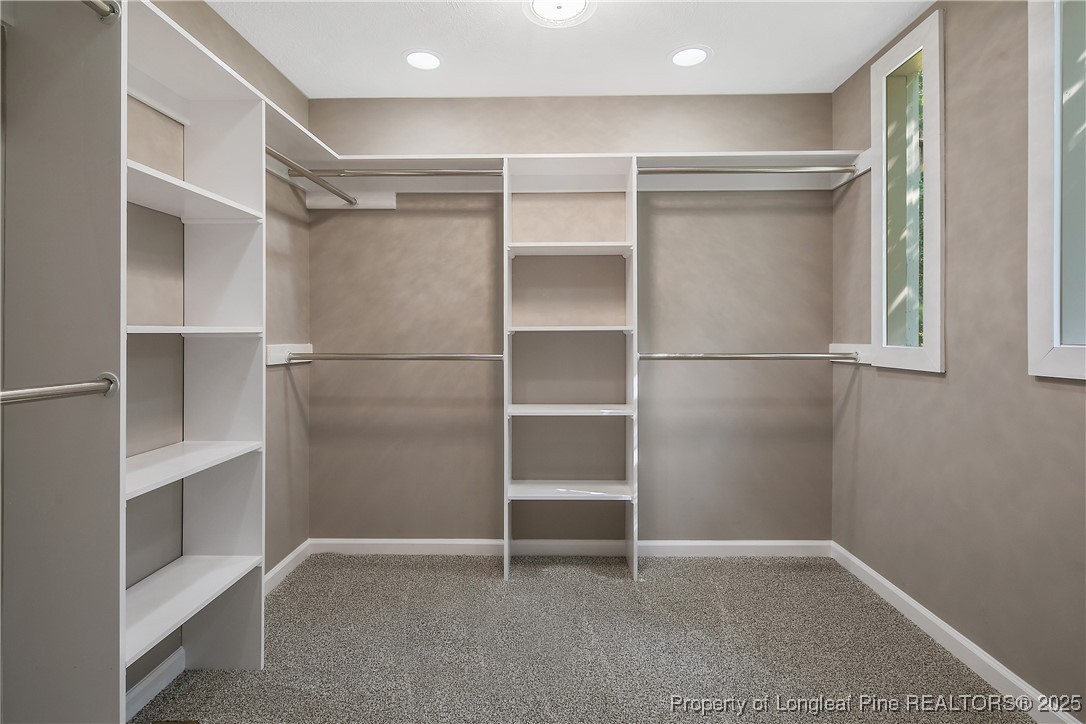 6062 Midus Street Hope Mills, NC 28348 - Photo 30 of 49 a view of an empty walk in closet