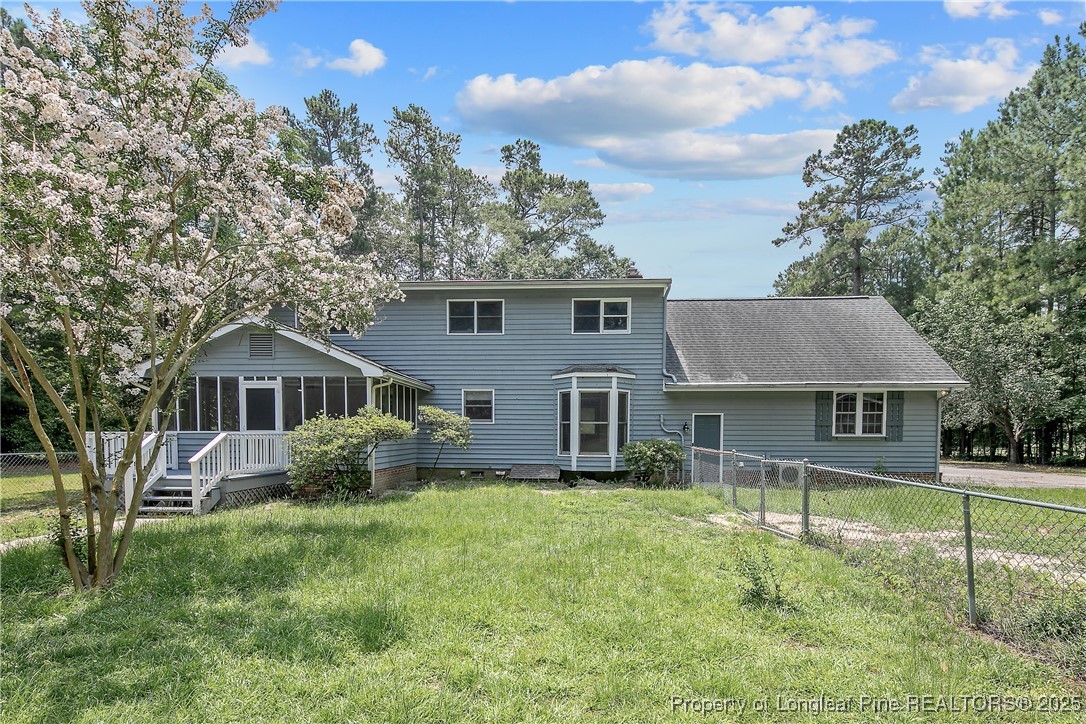 6062 Midus Street Hope Mills, NC 28348 - Photo 45 of 49 front view of a house with a yard