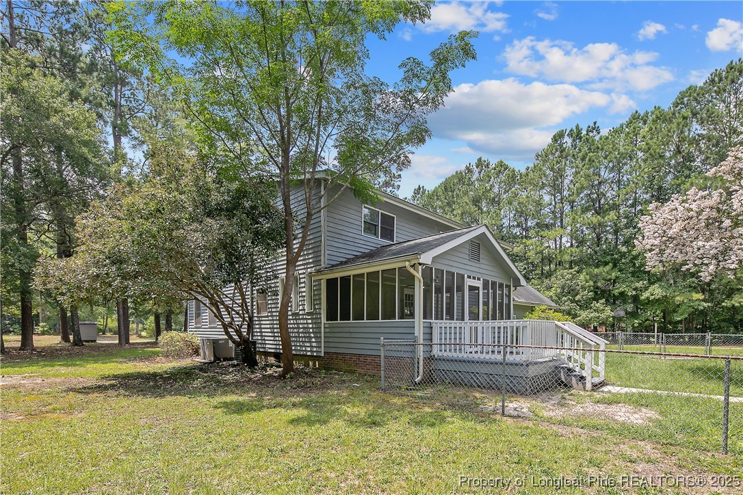 6062 Midus Street Hope Mills, NC 28348 - Photo 47 of 49 a view of a house with a yard balcony