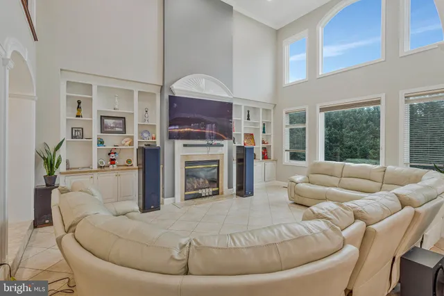 a kitchen with a sink a stove top oven and cabinets