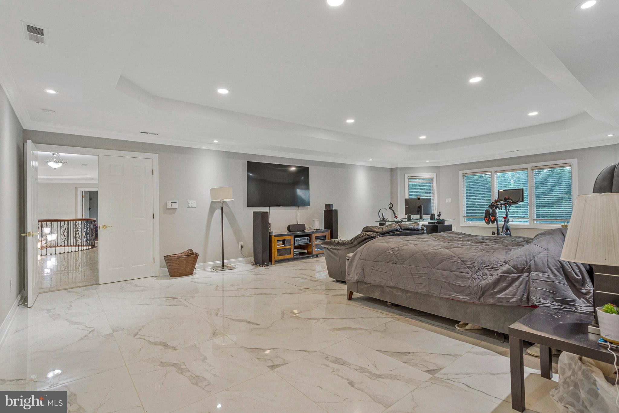 2901 George Howard Way Davidsonville, MD 21035 - Photo 33 of 70 a bed room with furniture and a flat screen tv