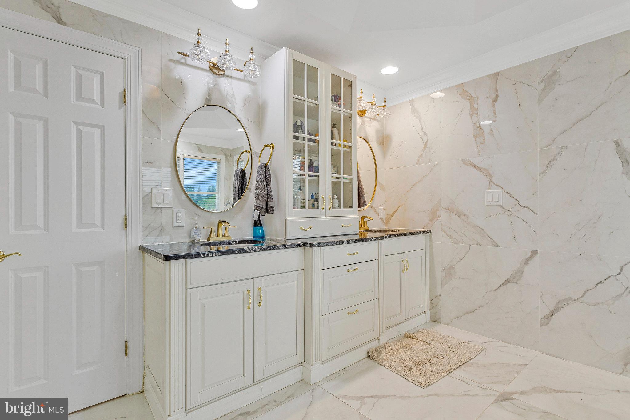 2901 George Howard Way Davidsonville, MD 21035 - Photo 34 of 70 a bathroom with a sink and a mirror