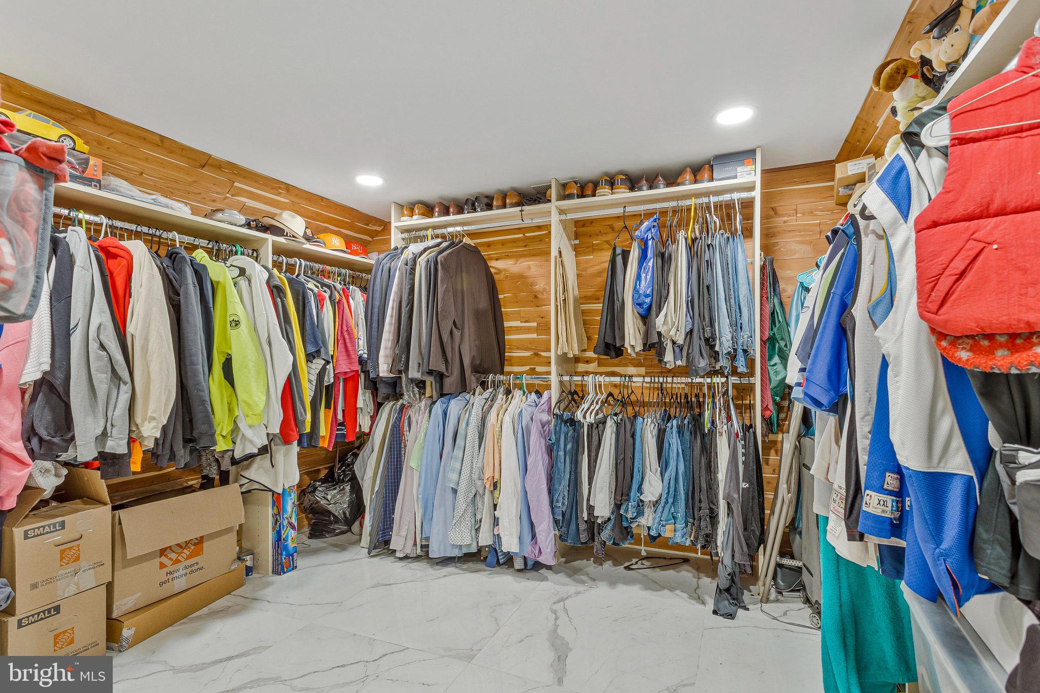 2901 George Howard Way Davidsonville, MD 21035 - Photo 44 of 70 a view of walk in closet with clothes