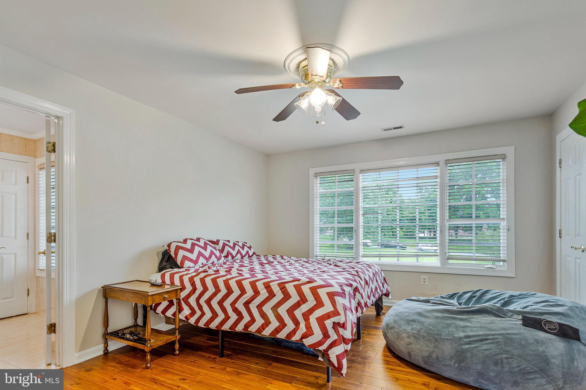 2901 George Howard Way Davidsonville, MD 21035 - Photo 46 of 70 a bedroom with a bed and a window