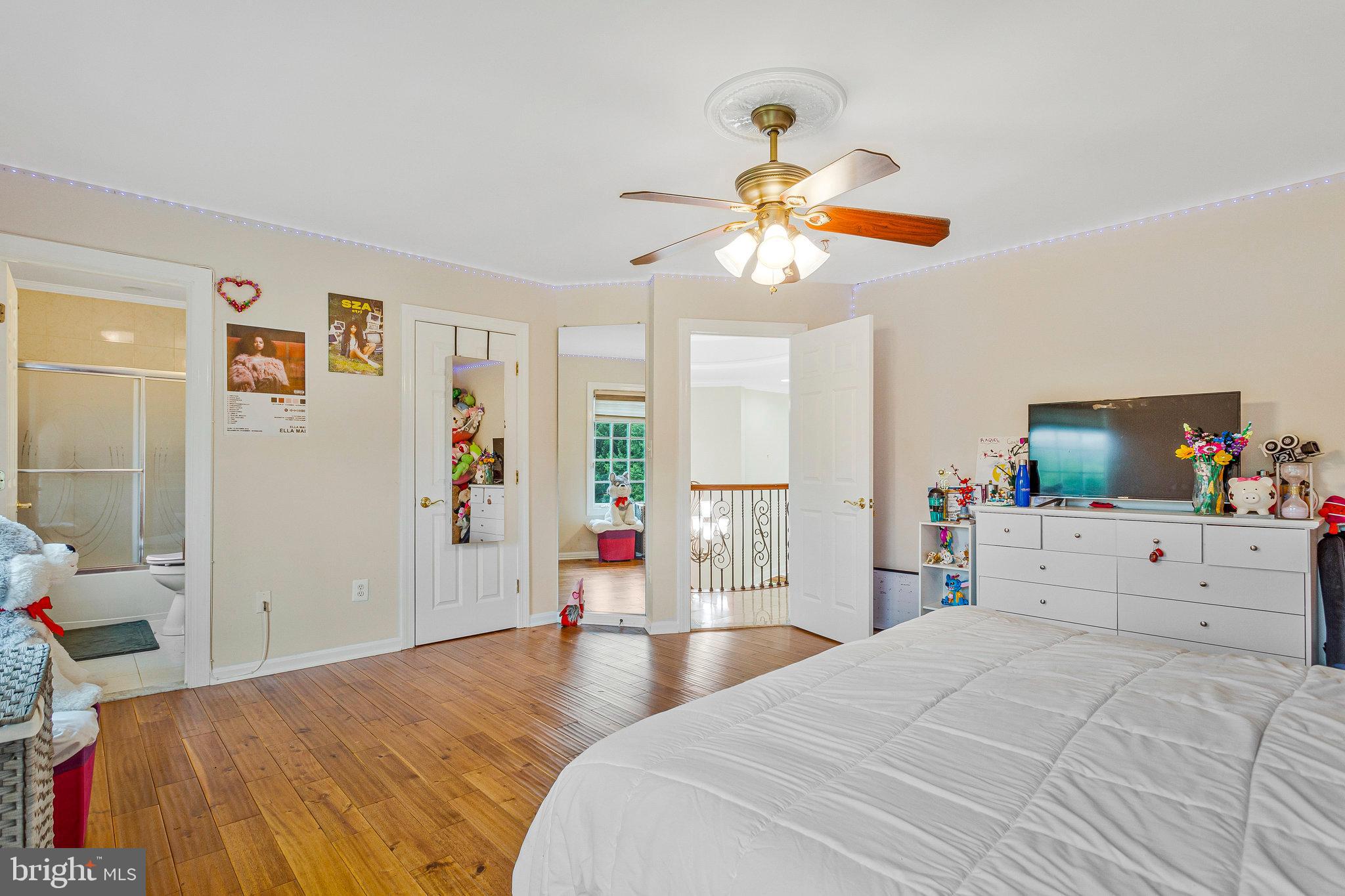 2901 George Howard Way Davidsonville, MD 21035 - Photo 50 of 70 a bedroom with a bed and a flat screen tv