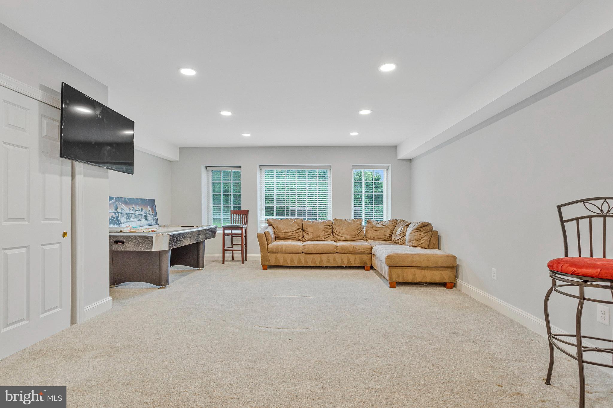 2901 George Howard Way Davidsonville, MD 21035 - Photo 54 of 70 a living room with furniture and a flat screen tv