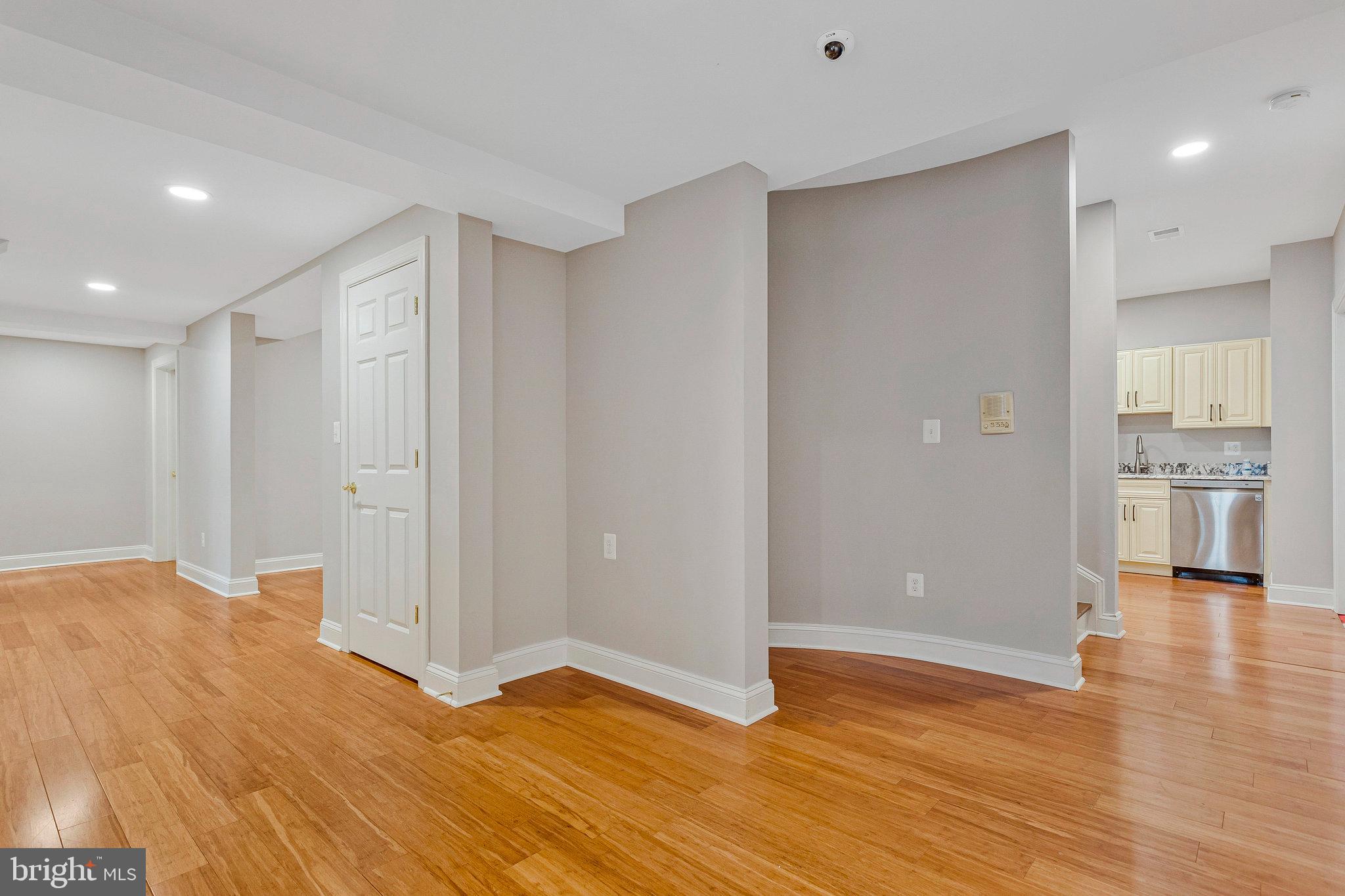 2901 George Howard Way Davidsonville, MD 21035 - Photo 63 of 70 a view of empty room with wooden floor and windows