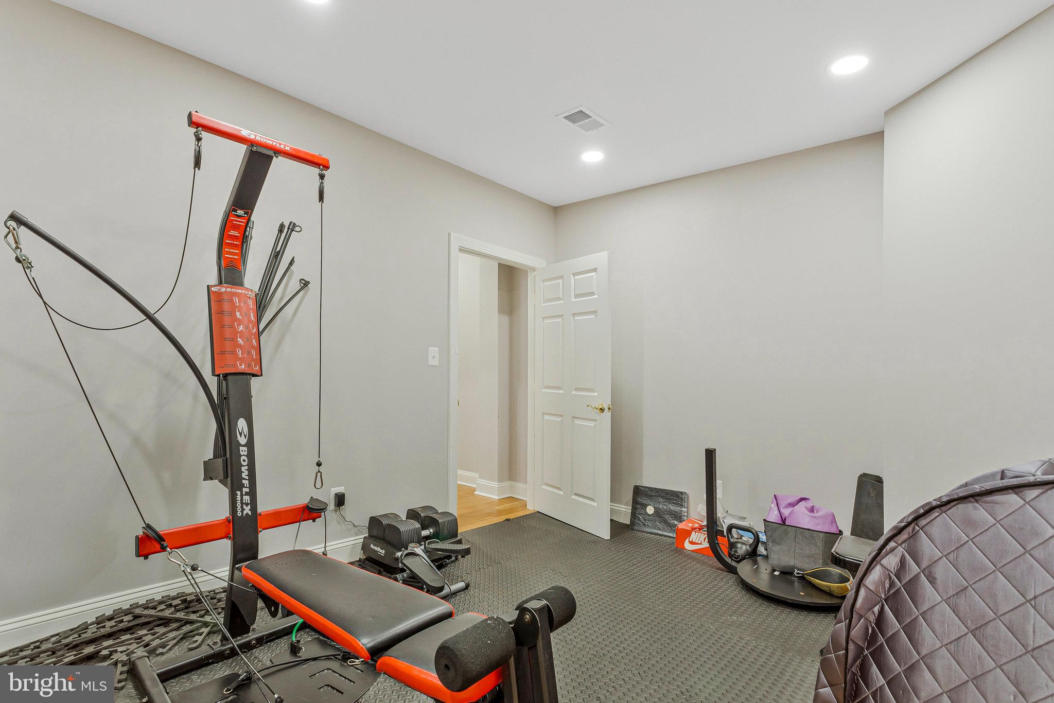 2901 George Howard Way Davidsonville, MD 21035 - Photo 67 of 70 a room with furniture and wooden floor