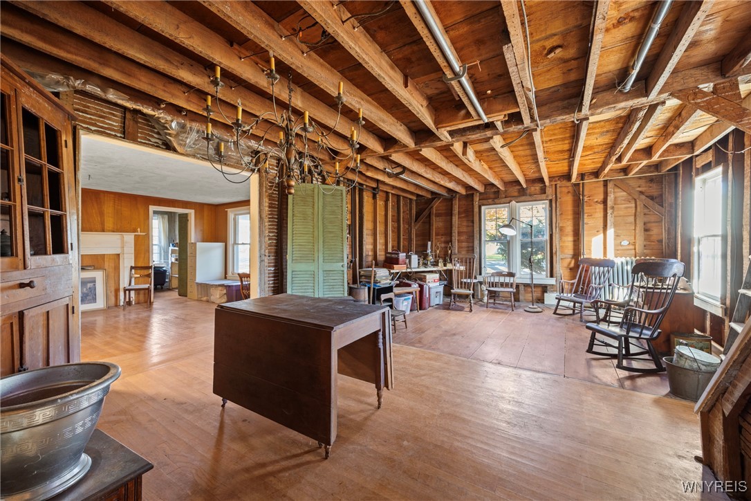 399 Lockport Street Porter, NY 14174 - Photo 14 of 50 dining area opens to living room with wide plank f