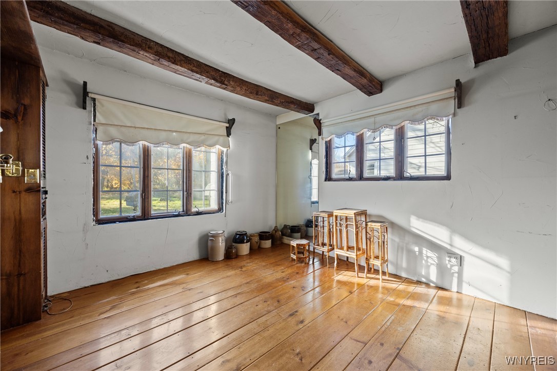 399 Lockport Street Porter, NY 14174 - Photo 23 of 50 first floor bedroom with plank wood floors and bea