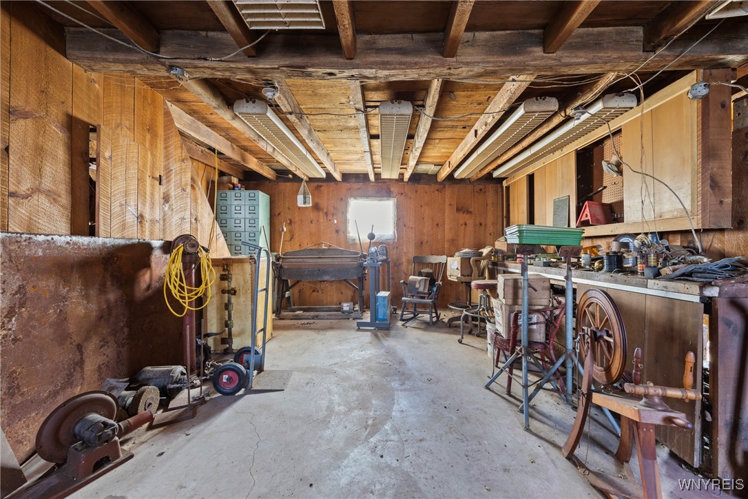 399 Lockport Street Porter, NY 14174 - Photo 39 of 50 main barn area with full staircase to floored seco