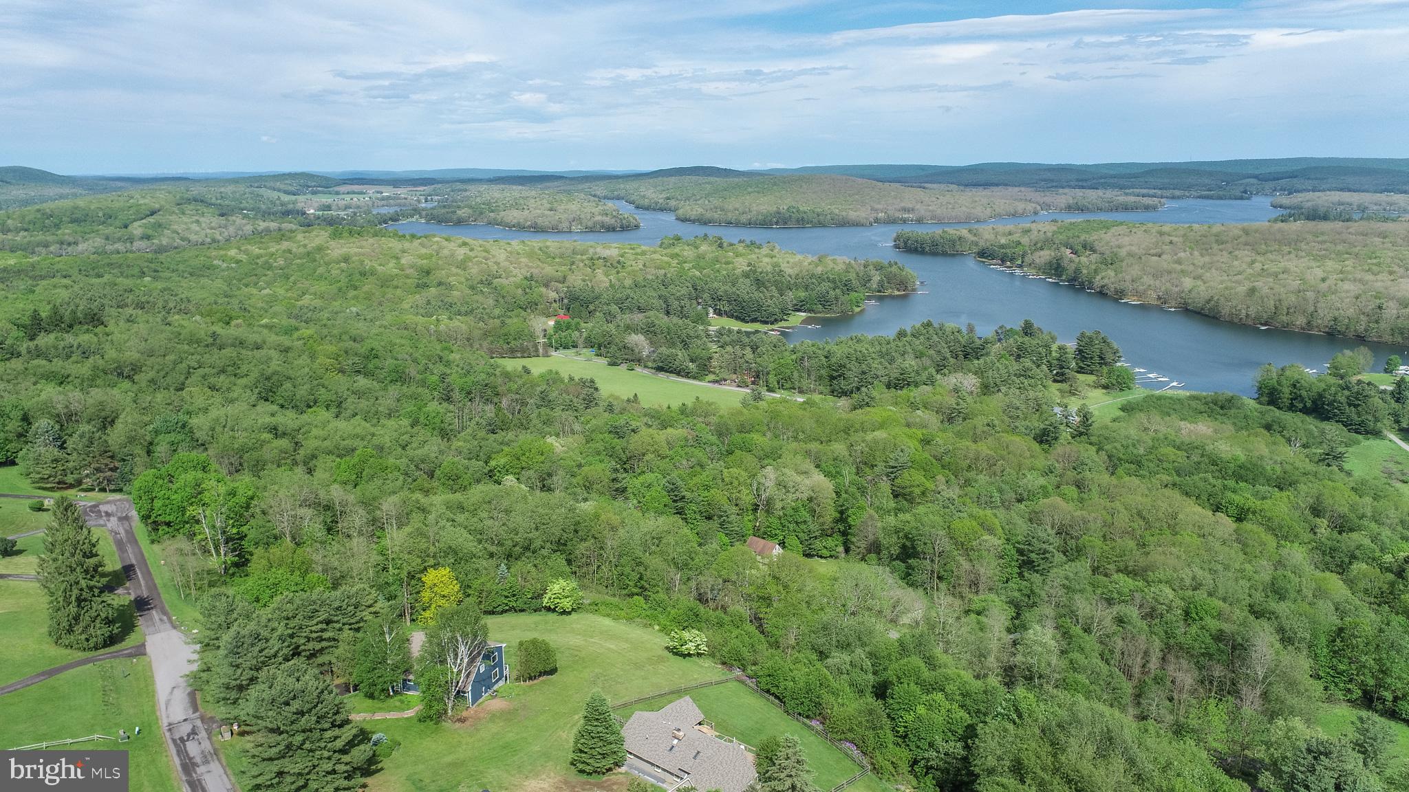 467 Paradise Ridge Road Oakland, MD 21550 - Photo 63 of 64 a view of a lake with a mountain