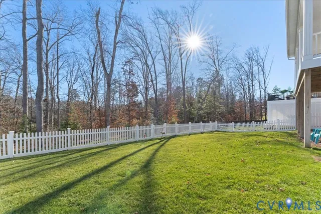 a view of a swimming pool with an outdoor space and seating area