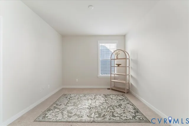 a view of a room with rack on the wall