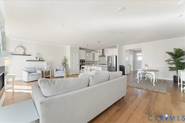 a living room with furniture and a table