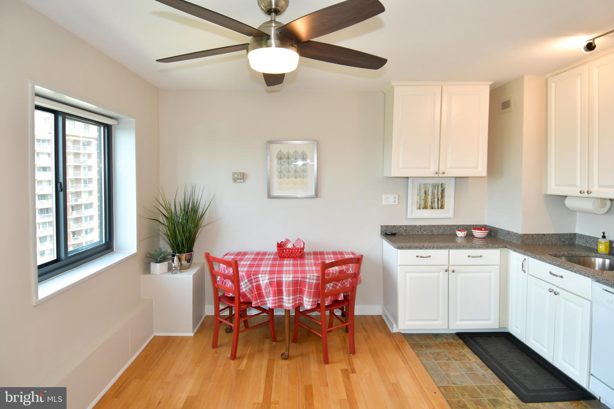 1200 South Arlington Ridge Road, Unit 704 Arlington, VA 22202 - Photo 8 of 30 Dining Area with Ceiling Fan