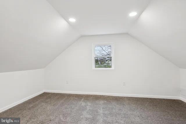 an empty room with a hallway