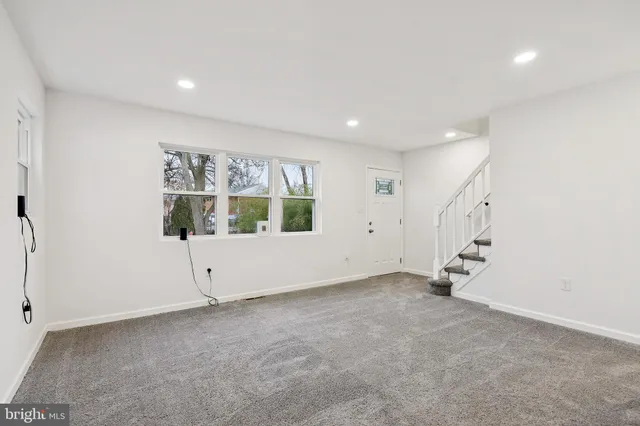 an empty room with windows