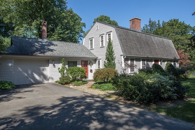 69 Fox Farms Road Northampton, MA 01062 - Photo 1 of 38 a front view of a house with a garden and plants