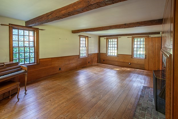 69 Fox Farms Road Northampton, MA 01062 - Photo 27 of 38 a view of an empty room with wooden floor and a window