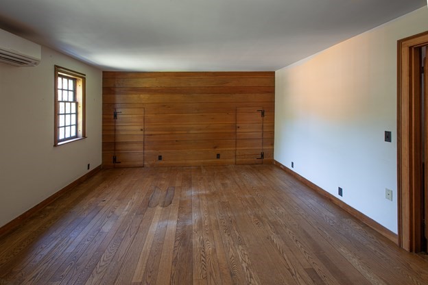 69 Fox Farms Road Northampton, MA 01062 - Photo 35 of 38 an empty room with wooden floor and windows
