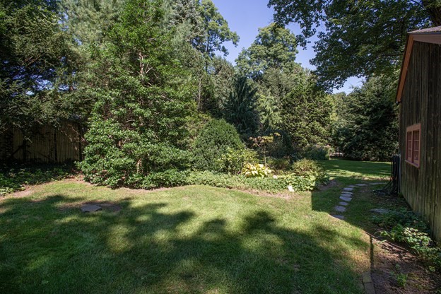 69 Fox Farms Road Northampton, MA 01062 - Photo 6 of 38 a view of a yard with plants and large trees