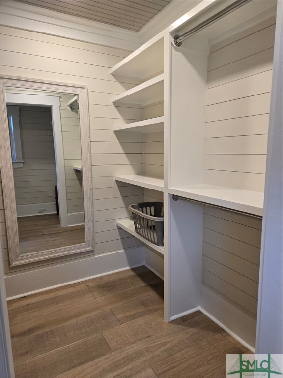 1318 Wilmington Island Road, Unit A Savannah, GA 31410 - Photo 16 of 22 Walk in closet with shelving and full mirror