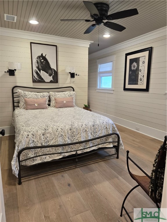 1318 Wilmington Island Road, Unit A Savannah, GA 31410 - Photo 7 of 22 Queen iron bed, armoire.
Sconces over headboard.