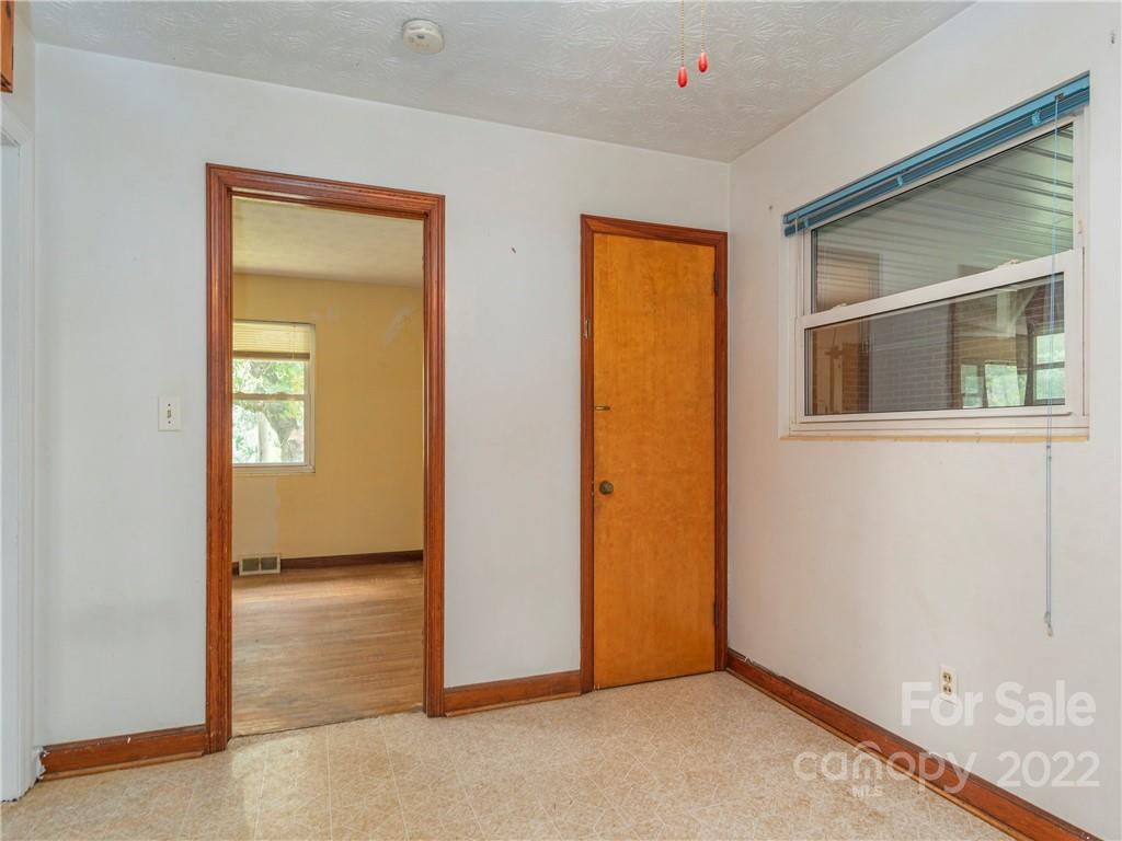 764 North Canton Road Canton, NC 28716 - Photo 7 of 16 an empty room that has a window