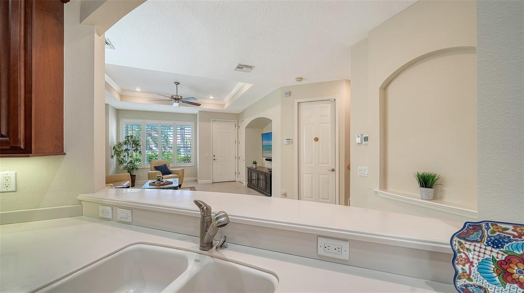 1116 Beachcomber Court, Unit 3 Osprey, FL 34229 - Photo 23 of 65 a living room with furniture and a potted plant
