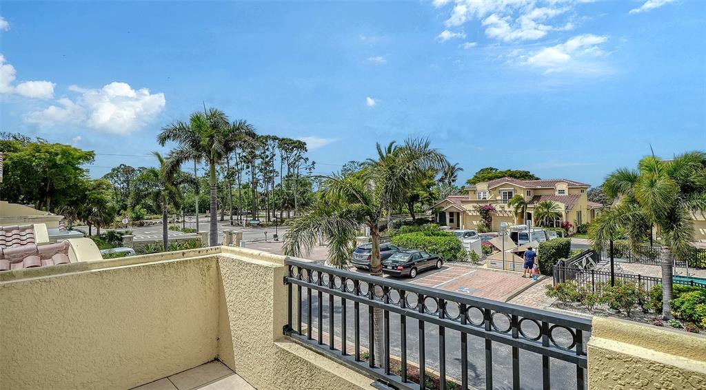 1116 Beachcomber Court, Unit 3 Osprey, FL 34229 - Photo 40 of 65 a view of a balcony with outdoor space