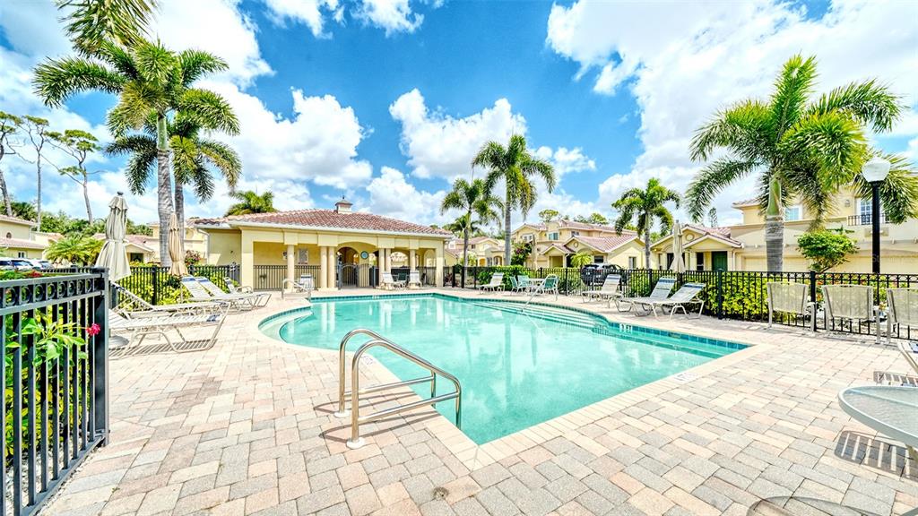 1116 Beachcomber Court, Unit 3 Osprey, FL 34229 - Photo 49 of 65 a view of a house with swimming pool and sitting area