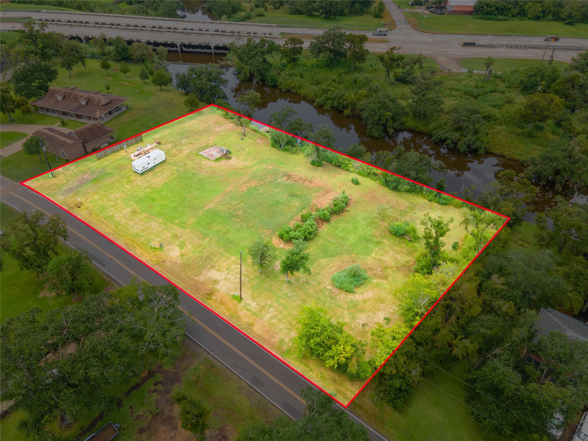 315 Edgewater Street Clute, TX 77531 - Photo 2 of 10 a view of swimming pool from a balcony