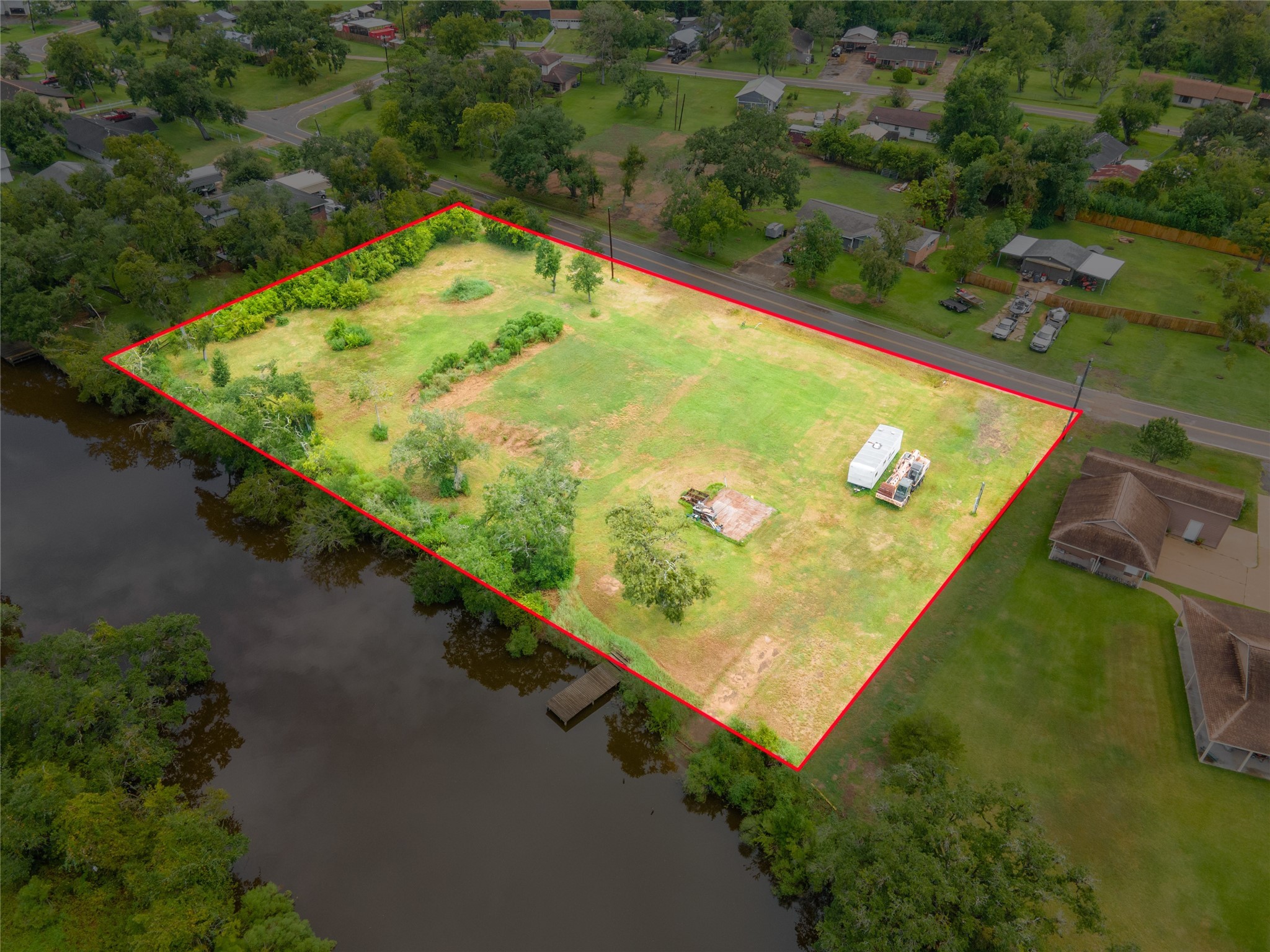 315 Edgewater Street Clute, TX 77531 - Photo 9 of 10 an aerial view of swimming pool with a yard