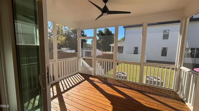 a view of a balcony with wooden floor