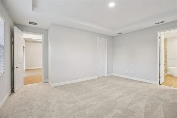 a view of an empty room and window