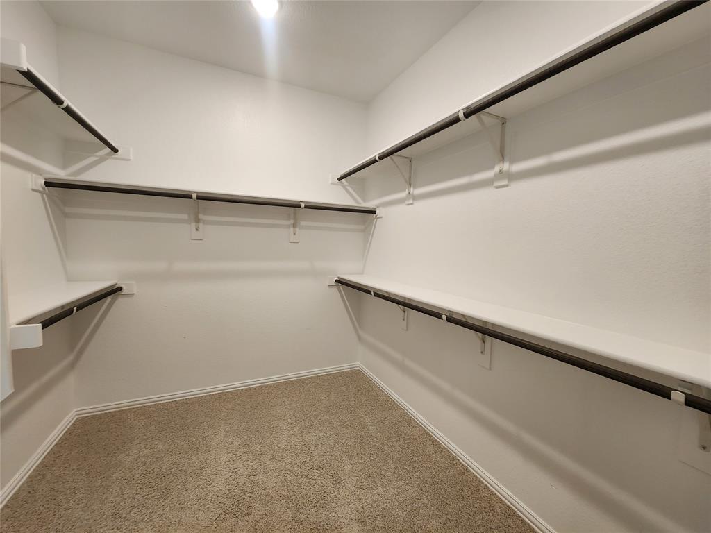 1024 Timber Ridge Drive Justin, TX 76247 - Photo 16 of 25 Primary bedroom closet