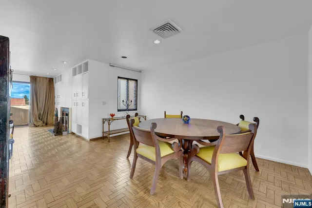 a view of a dining room with furniture