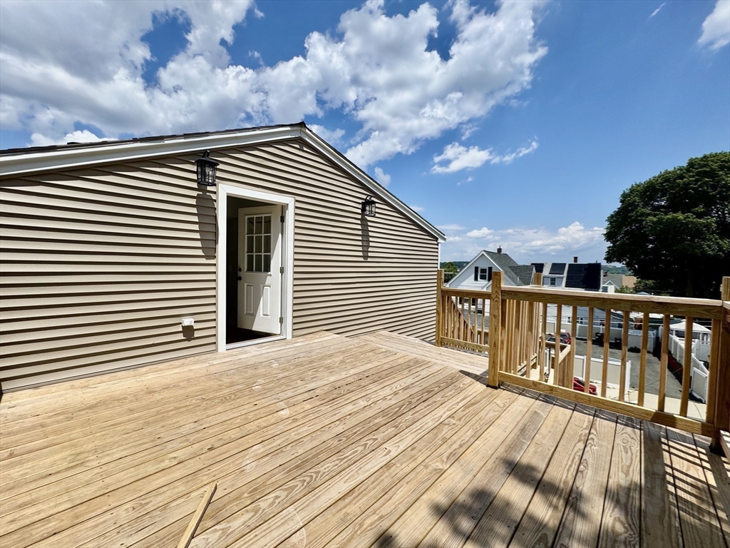 201 Belmont Street, Unit 2 Everett, MA 02149 - Photo 16 of 19 a view of deck with patio