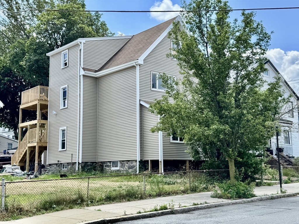 201 Belmont Street, Unit 2 Everett, MA 02149 - Photo 18 of 19 a view of back yard of the house