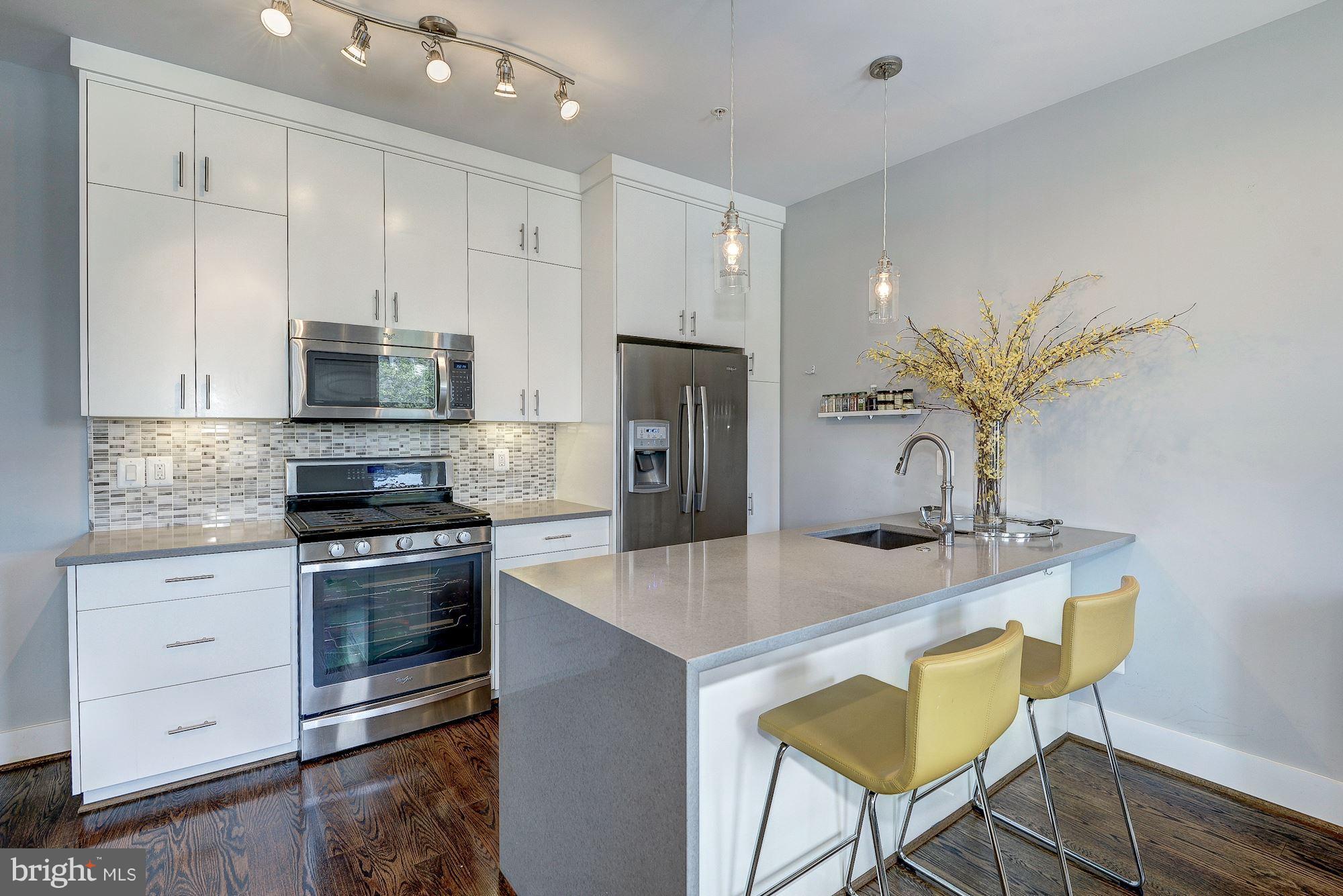 1478 Harvard Street Northwest, Unit 3 Washington, DC 20009 - Photo 2 of 26 Whirlpool appliances, quarts counters