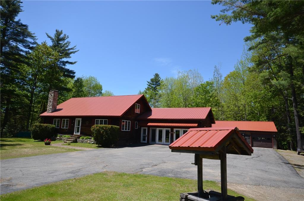 851 Enfield Road Lincoln, ME 04457 - Photo 1 of 21 Maine log home for sale in Lincoln ME