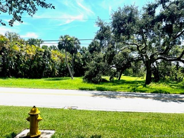 140 North Sewalls Point Road Sewall's Point, FL 34996 - Photo 2 of 3 a view of a yard and basketball court