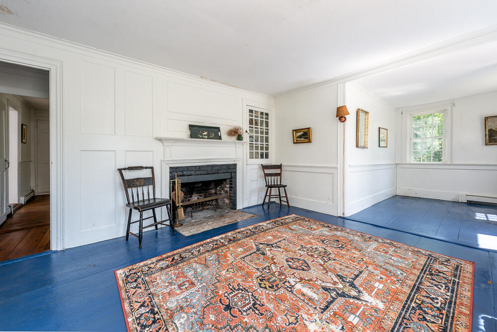 46 South Pamet Road Truro, MA 02666 - Photo 11 of 68 a living room with furniture and a fireplace